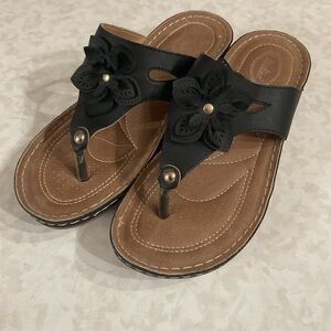 Italina Black Floral Thong Sandals with Gold Accents. Size 9/ 39